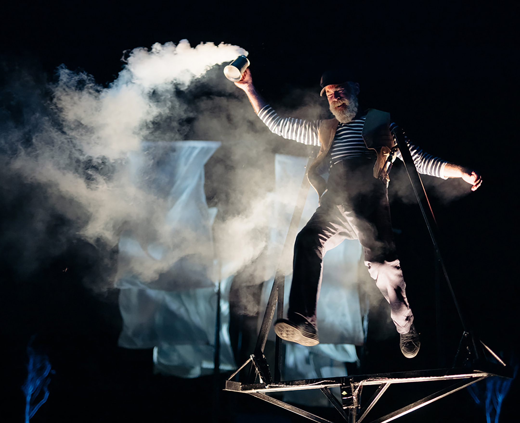 A performer in the sky with smoke